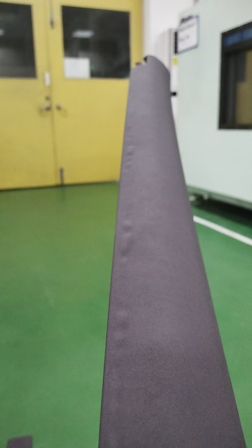 Actual blistering on an anonymized door-trim skin after heat testing